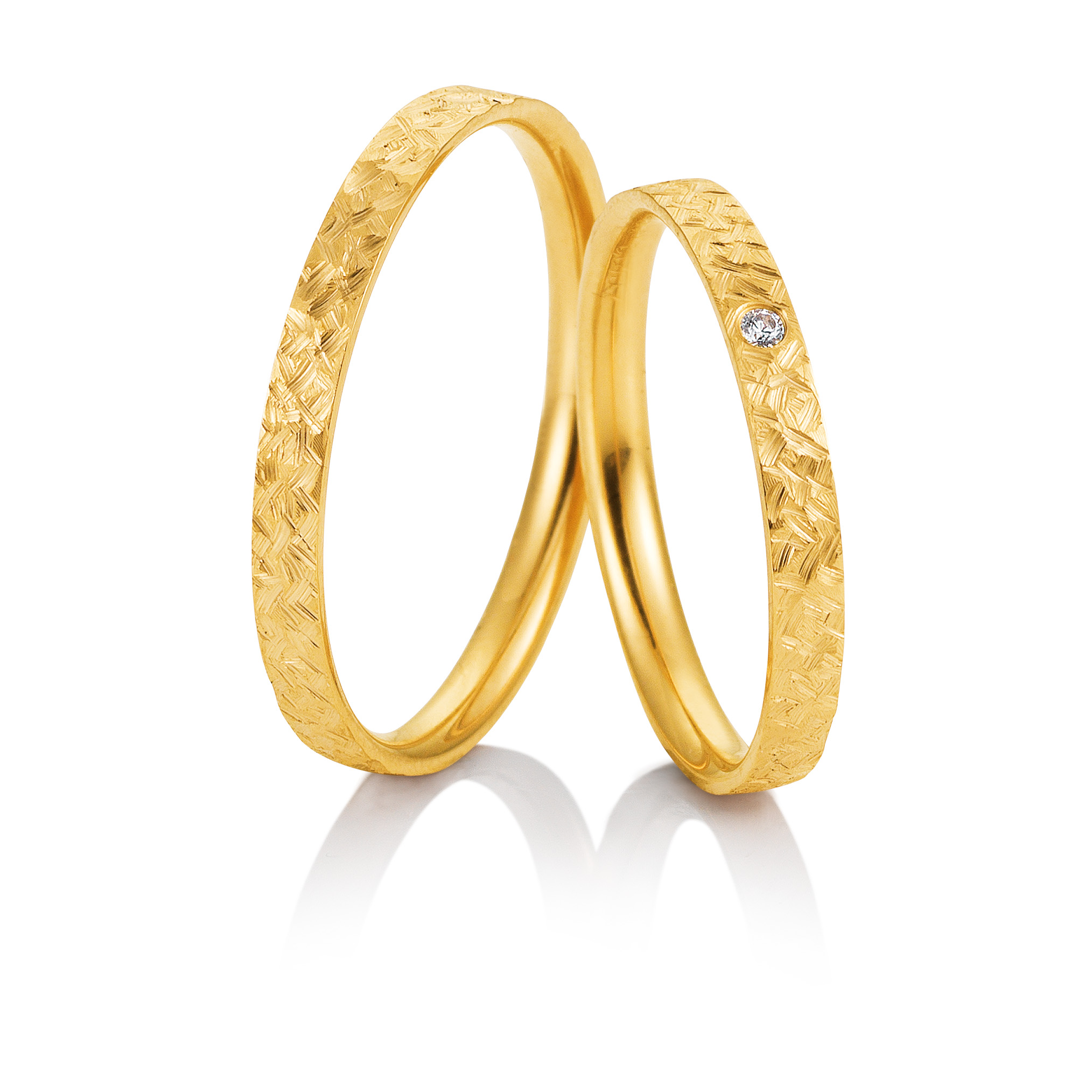 Alliances de mariage Breuning en or jaune avec 1 diamant lediamant.ch