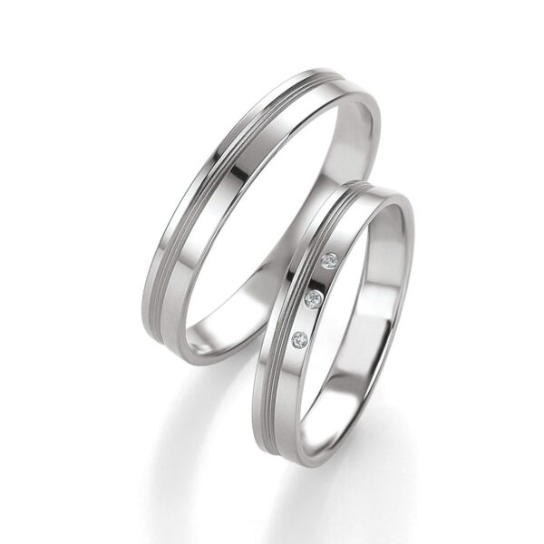 Alliances de mariage Breuning en or blanc avec 3 diamants lediamant.ch