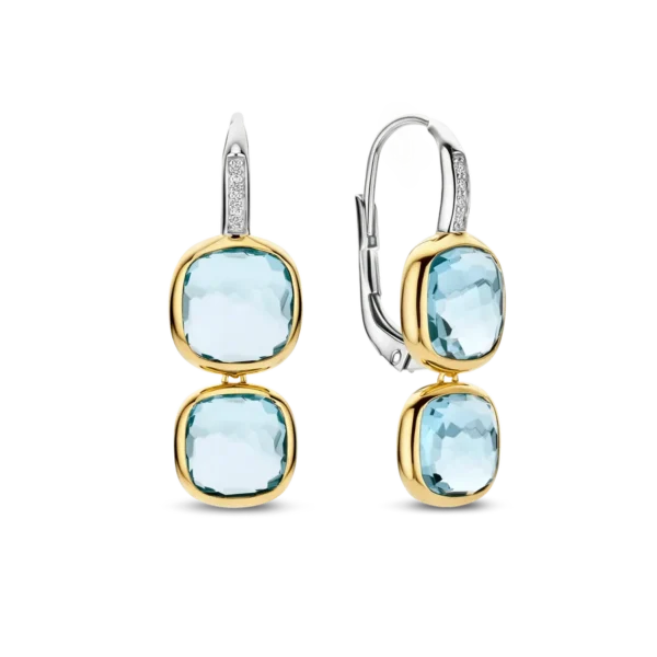 Boucles d’oreilles pendantes en or, argent et topazes bleues