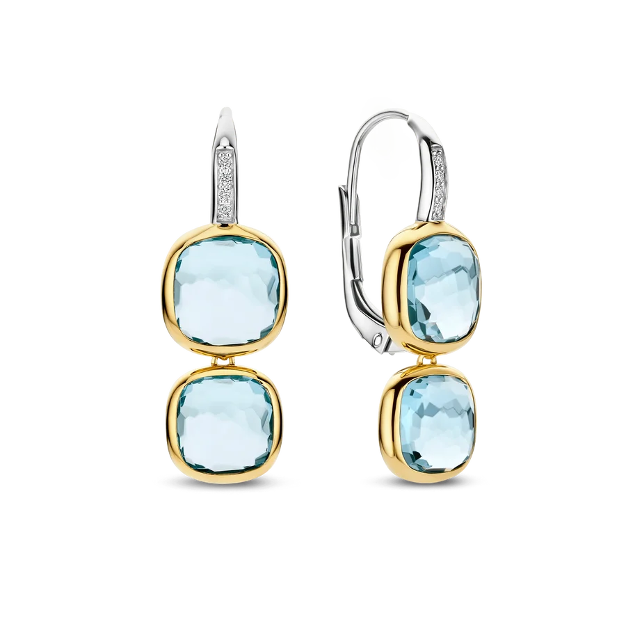Boucles d’oreilles pendantes en or, argent et topazes bleues